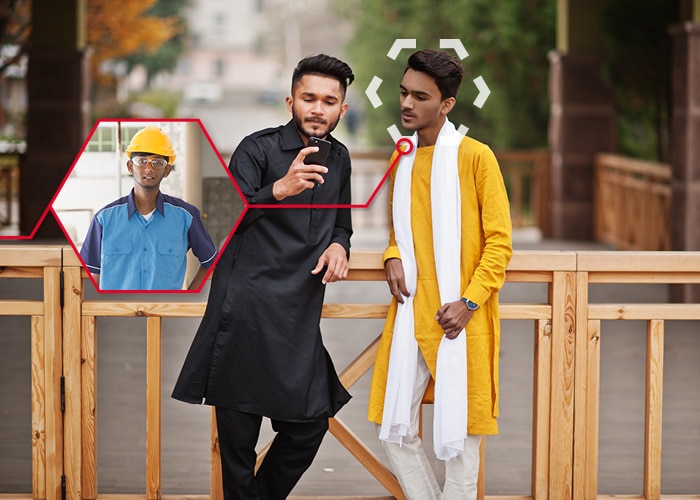 Two young men are standing outside. One of them is holding up his smartphone and they are looking at the screen. One of them can also be seen in a smaller picture with a safety helmet infront of a production site.