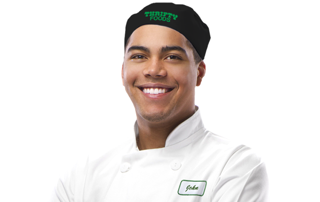 Male Thrifty Foods Baker smiling