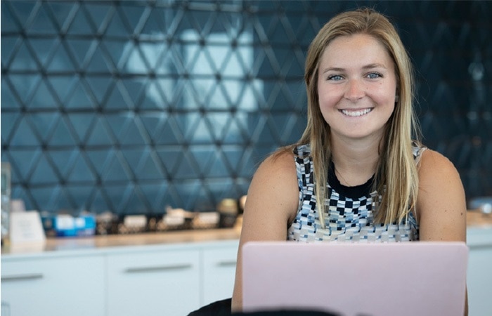 Dominion Energy employee working on a computer