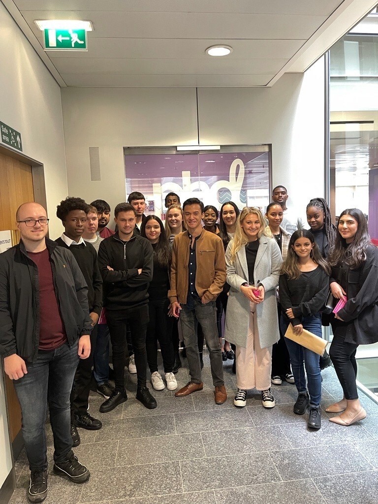 A group of apprentices posing for a picture at OMG UK in their first week