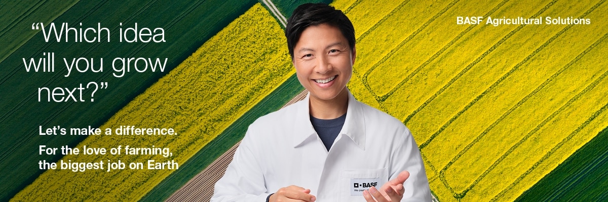 A person wearing a white lab coat with 