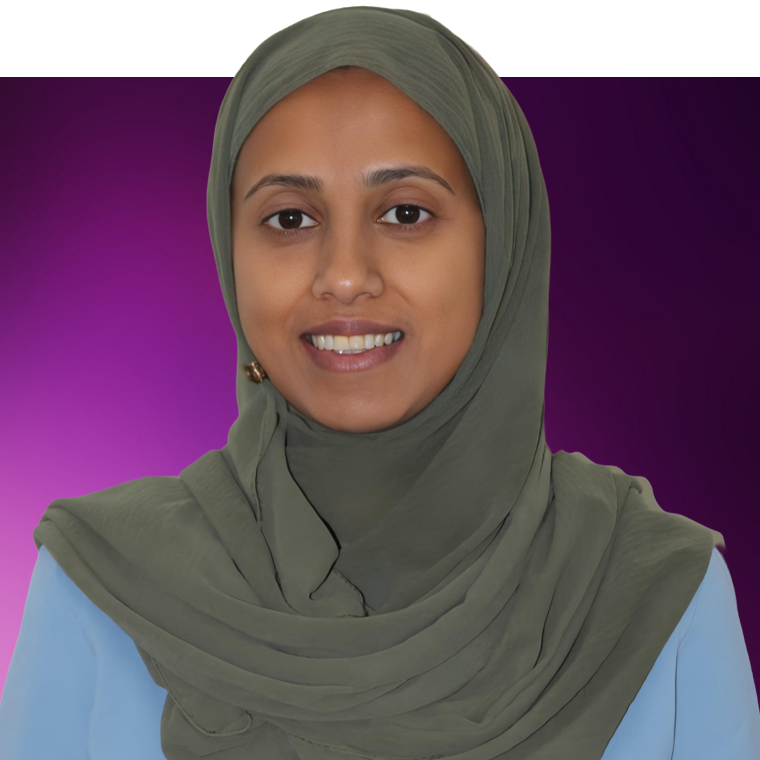 A colleague wearing a green hijab over a light blue top.