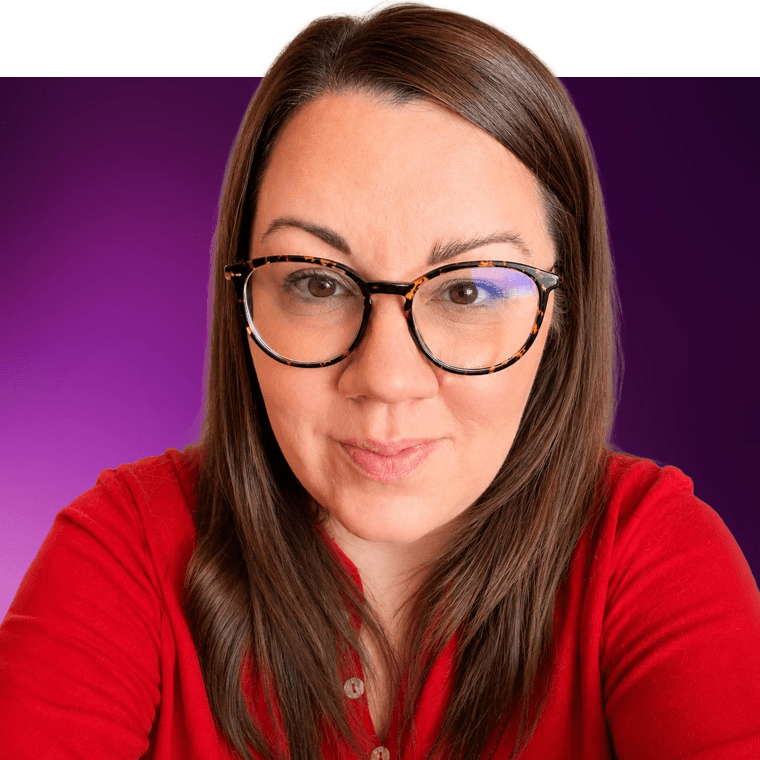 A colleague wearing glasses and a red top with dark coloured hair.