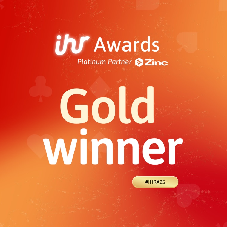 The words 'gold winner' on a red and orange background. 
