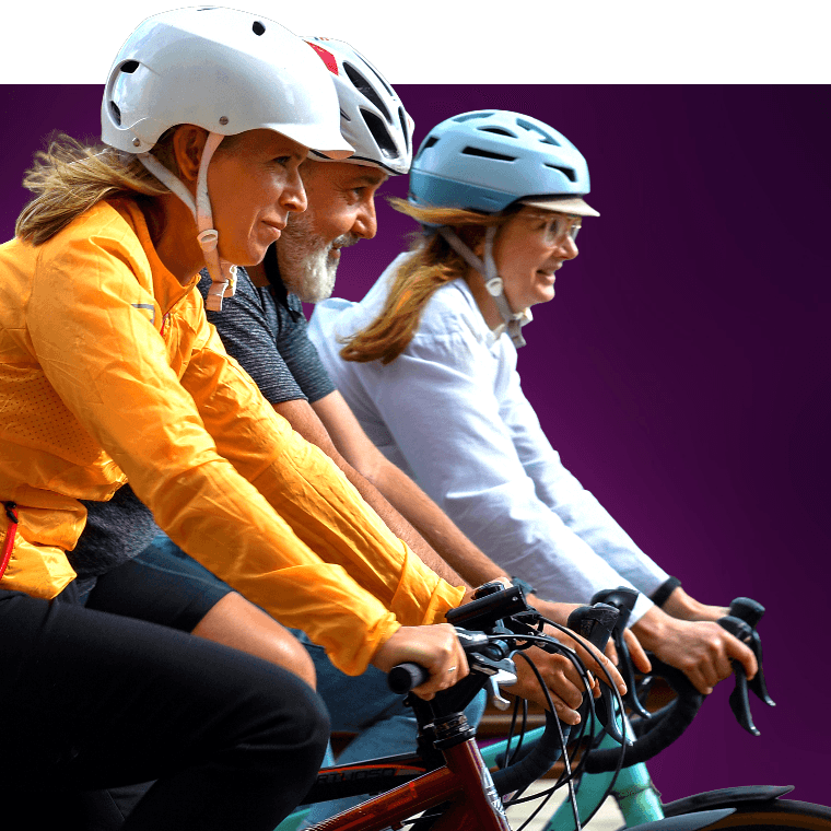 Three colleagues cycling.