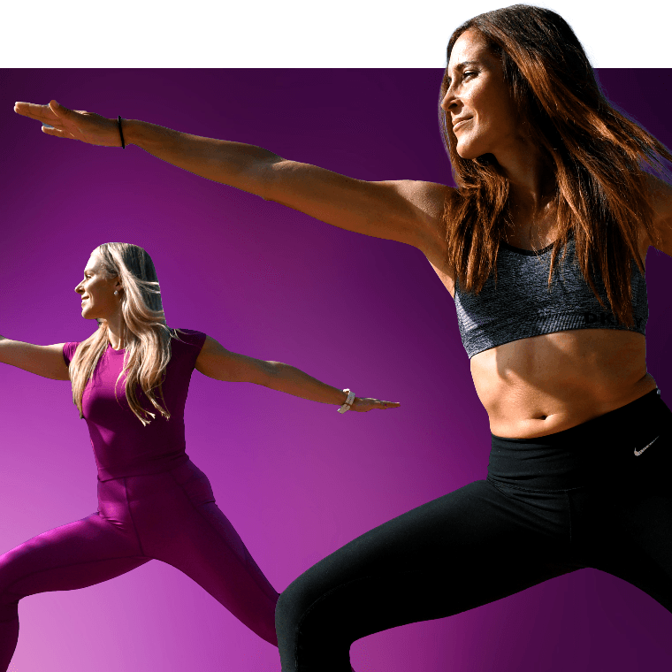 Two colleagues doing yoga.