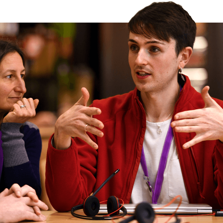 A colleague explaining something with their hands.