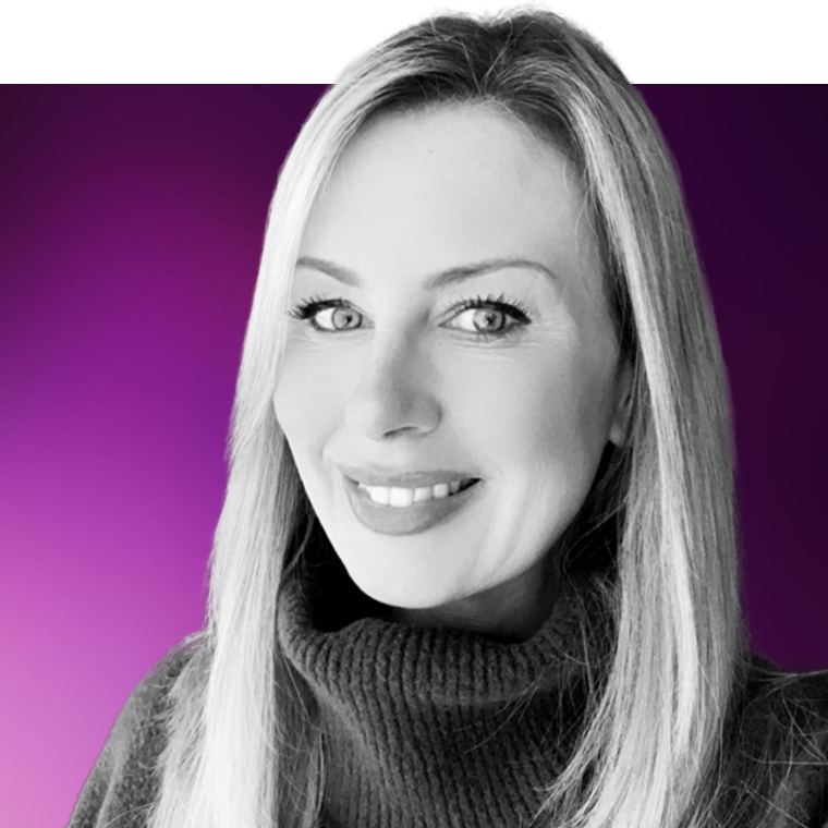 A black and white photo of a colleague with light hair and a turtle neck jumper.