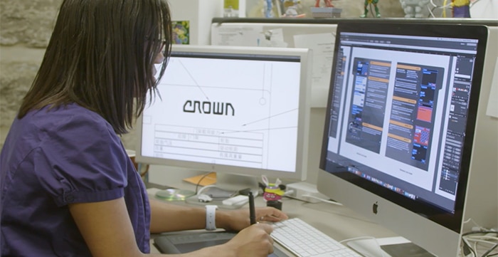 Crown employee working with digital design software