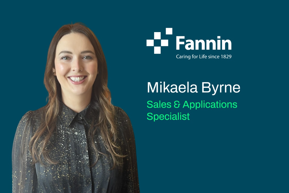 Portrait of Mikaela Byrne, Sales & Application Specialist, with a neutral background.