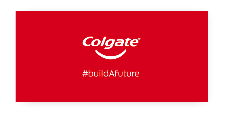 Белый логотип "Colgate Build A Future" на красном фоне