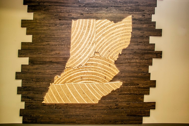 Image of wooden states on a wall.  The 4 states of KY, IN, OH and TN represent our market service areas.