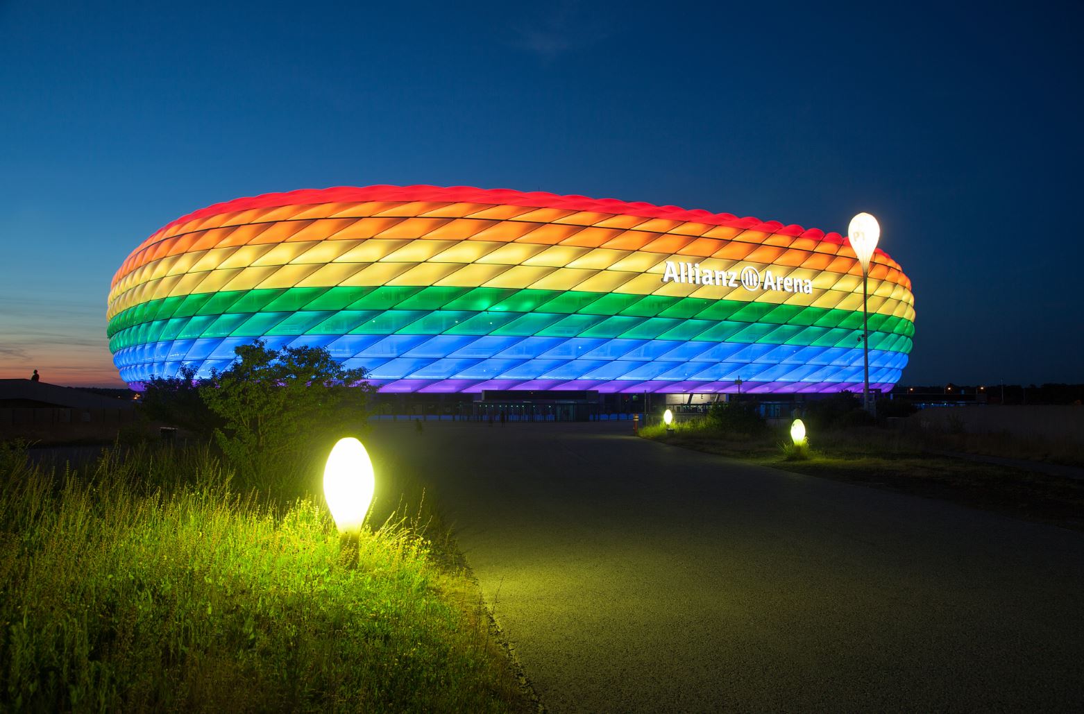 An image showing Allianz Arena light up in rainbow colors 